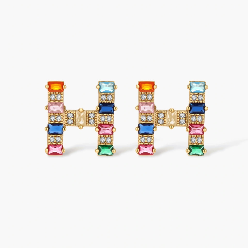 Gold-plated letter H jewelry set with multicolor zirconia stones in emerald cuts, showing necklace pendant and matching earrings