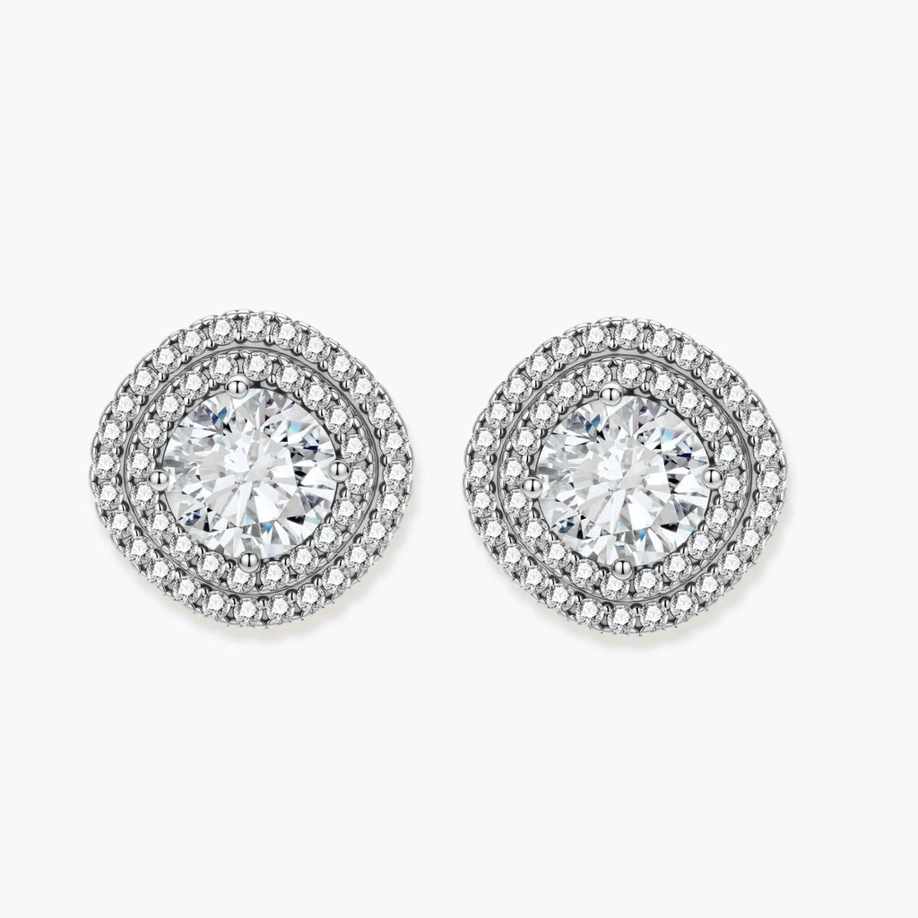 Double halo sterling silver stud earrings with brilliant round moissanite center stones and pavé crystal accents