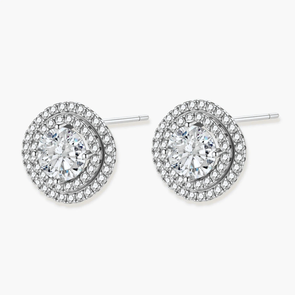 Double halo sterling silver stud earrings with brilliant round moissanite center stones and pavé crystal accents