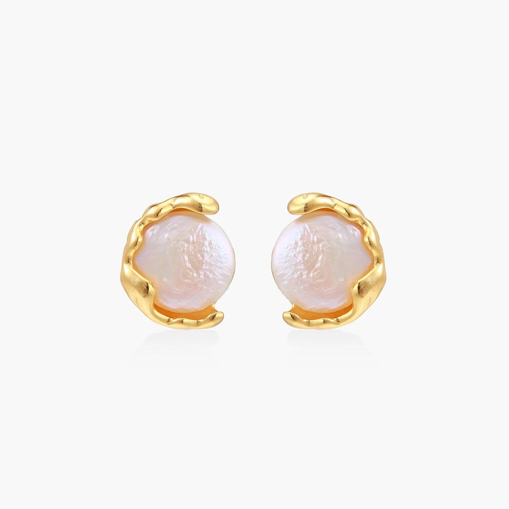 Gold vermeil studs with lustrous pink freshwater pearls in organic crescent settings