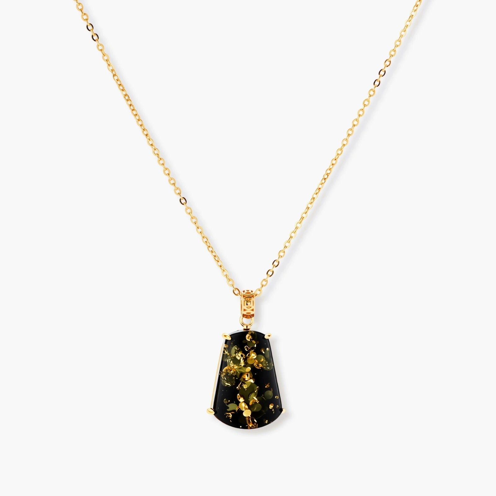 18k gold-plated necklace and earrings with green amber pendants featuring golden inclusions on cream background