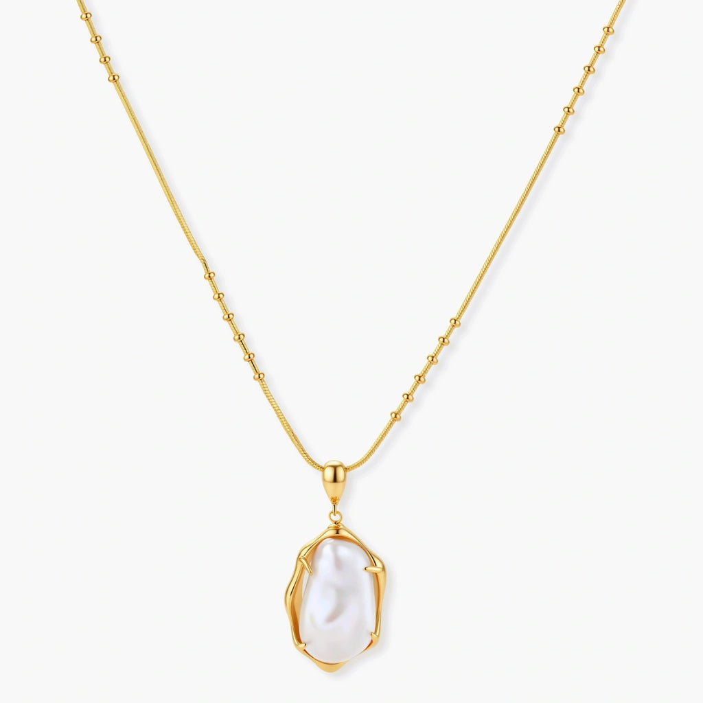 18K gold-plated sterling silver necklace with alternating bead chain and baroque pearl pendant on neutral background.
