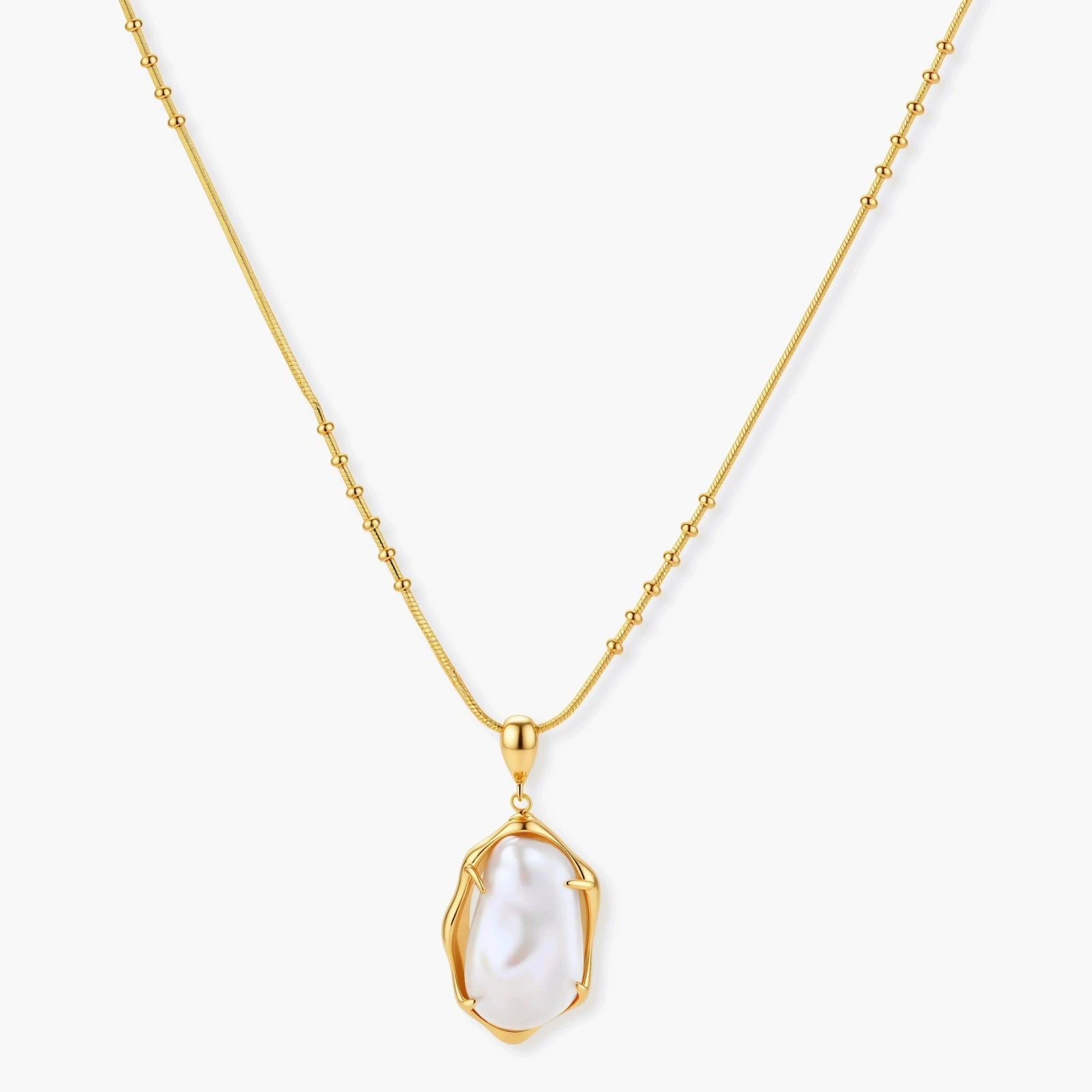 18K gold-plated sterling silver necklace with alternating bead chain and baroque pearl pendant on neutral background.