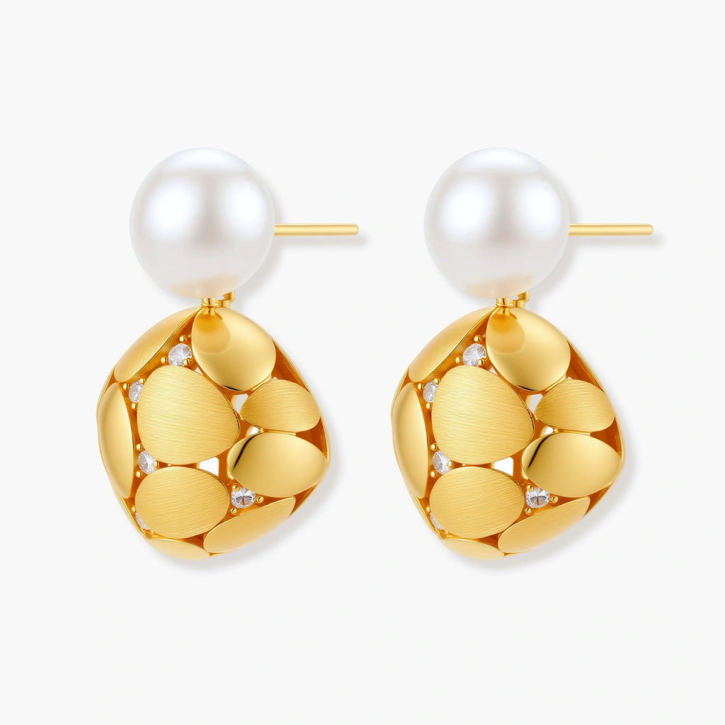 Gold-plated sterling silver drop earrings with white freshwater pearl studs and overlapping petal design with crystal accents