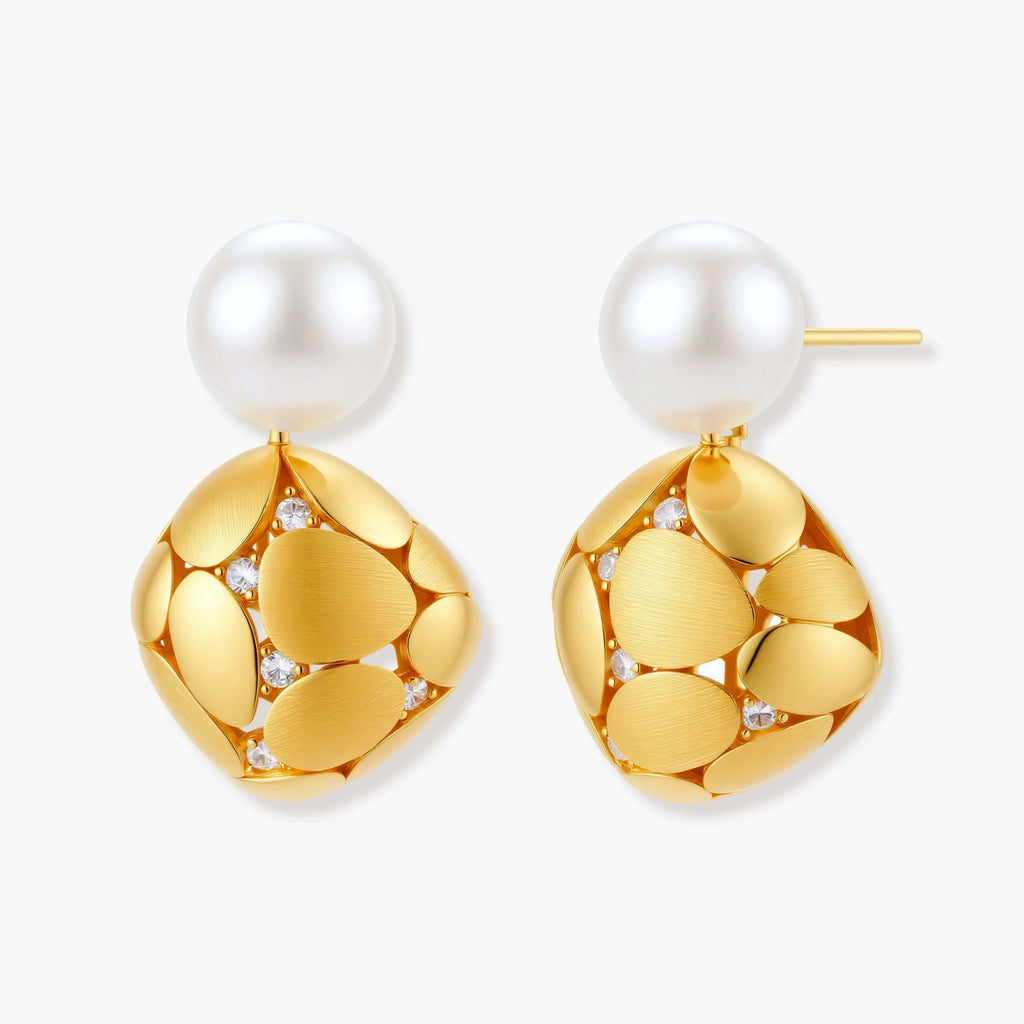 Gold-plated sterling silver drop earrings with white freshwater pearl studs and overlapping petal design with crystal accents