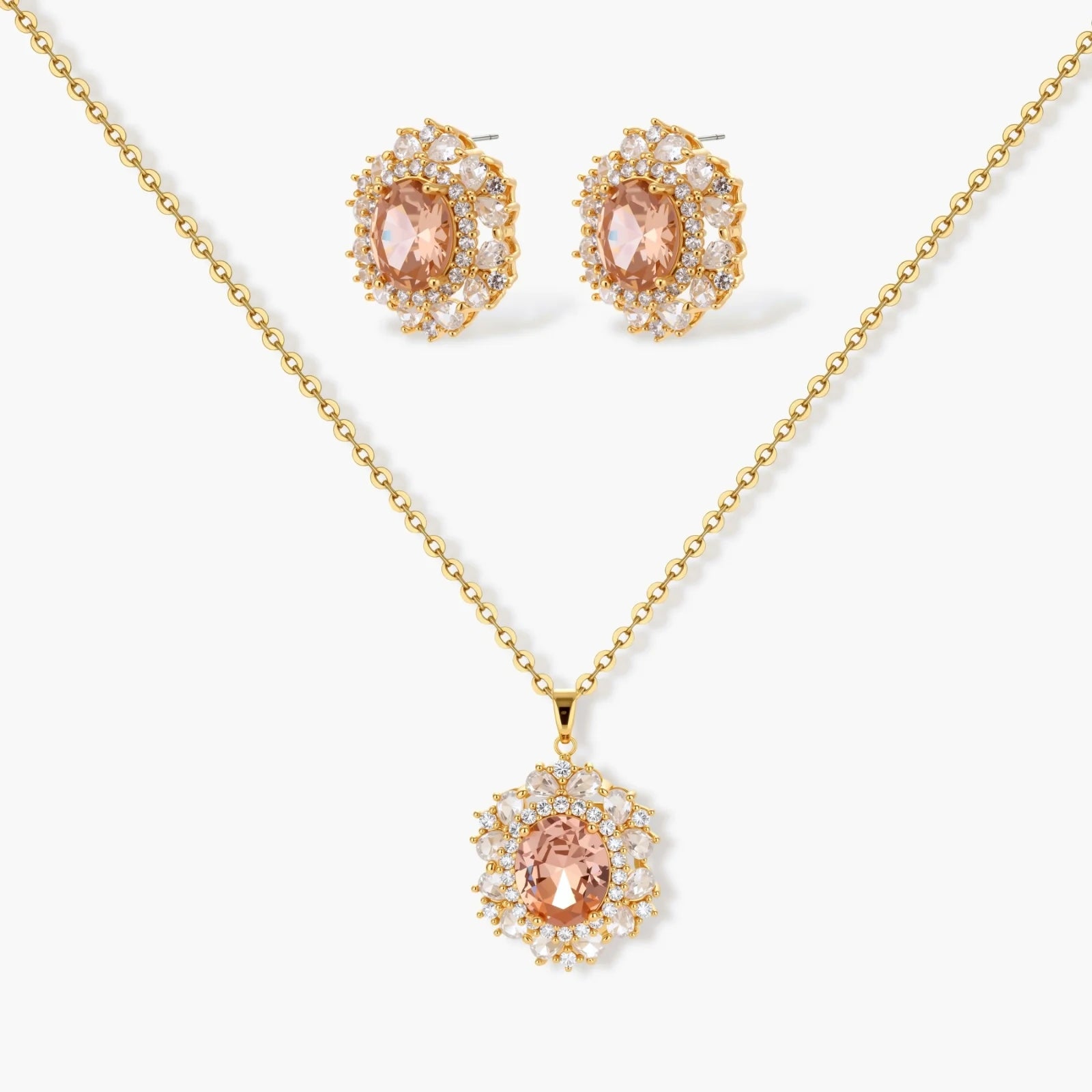 Ornate gold-plated jewelry set featuring peach center stone surrounded by clear AAA cubic zirconia crystals