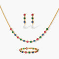 Gold-plated jewelry set with red, green, and blue cubic zirconia stones including necklace, bracelet, and drop earrings.