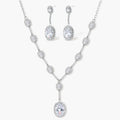 Elegant white gold plated jewelry set with oval cubic zirconia stones in halo settings, featuring Y-necklace and drop earrings.