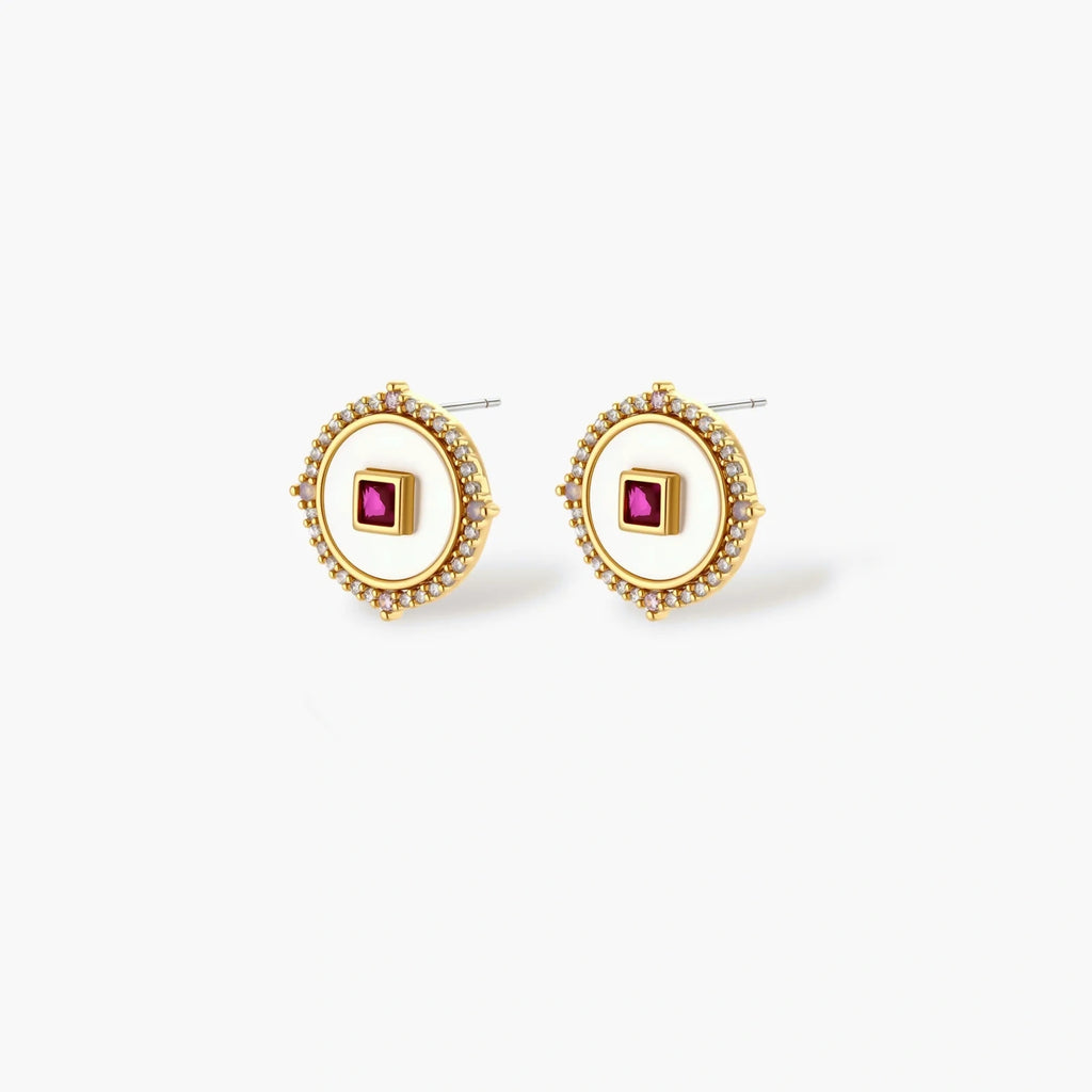 Gold-plated circular medallion necklace set with white enamel base and pink cubic zirconia accent stones
